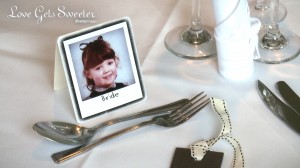 fun table place cards of childhood photos. This one is of the bride in primary school sat at the top table during their lake district wedding