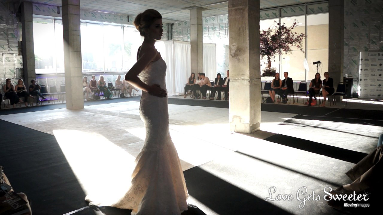 a model wears Caroline Castigliano dress on a catwalk
