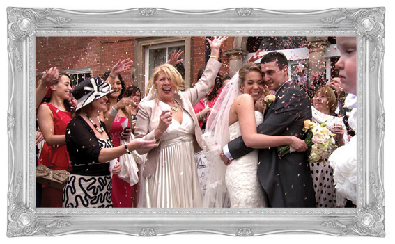 video still of a couple hugging during confetti at upper house