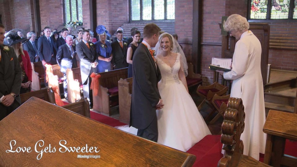 the wedding videographer love gets sweeter films the first look as the bride meets the groom at St Johns Church in High Legh Cheshire