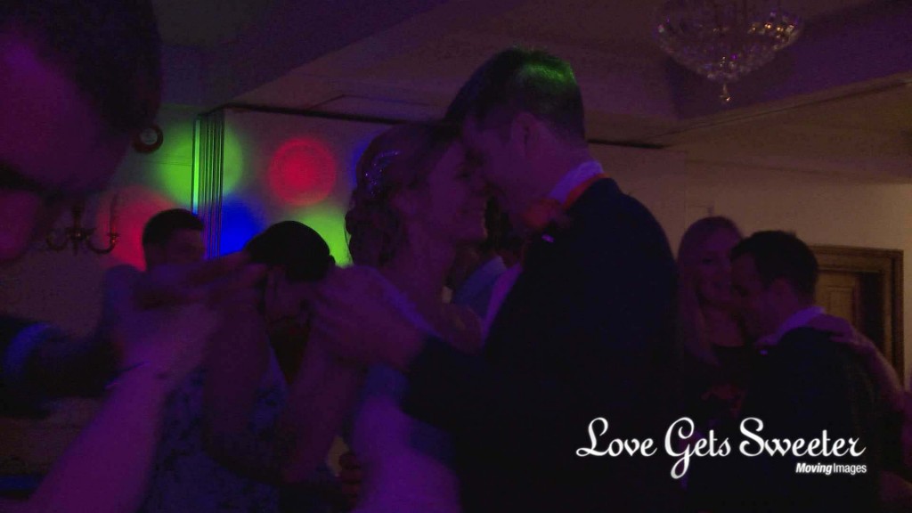 the bride and groom have a giggle and laugh on the dance floor during their wedding at Willington Hall in Cheshire