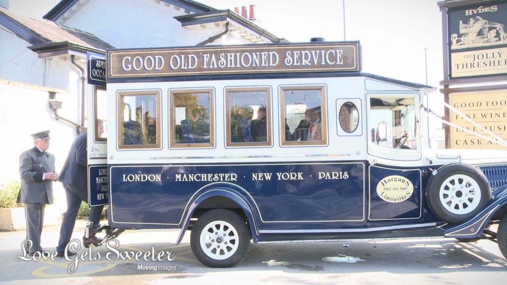 Alistair and his groomsmen climb in to the back of their traditional blue and cream hired Horgans wedding bus before heading to the church in High Legh Cheshire