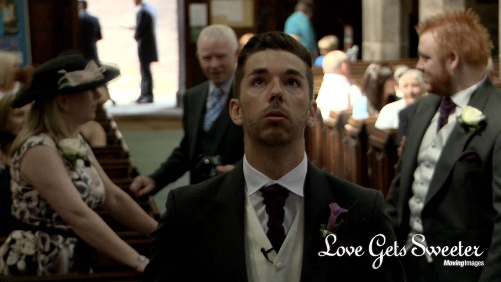 tears in eyes of nervous groom at St Marys Church in Sandbach