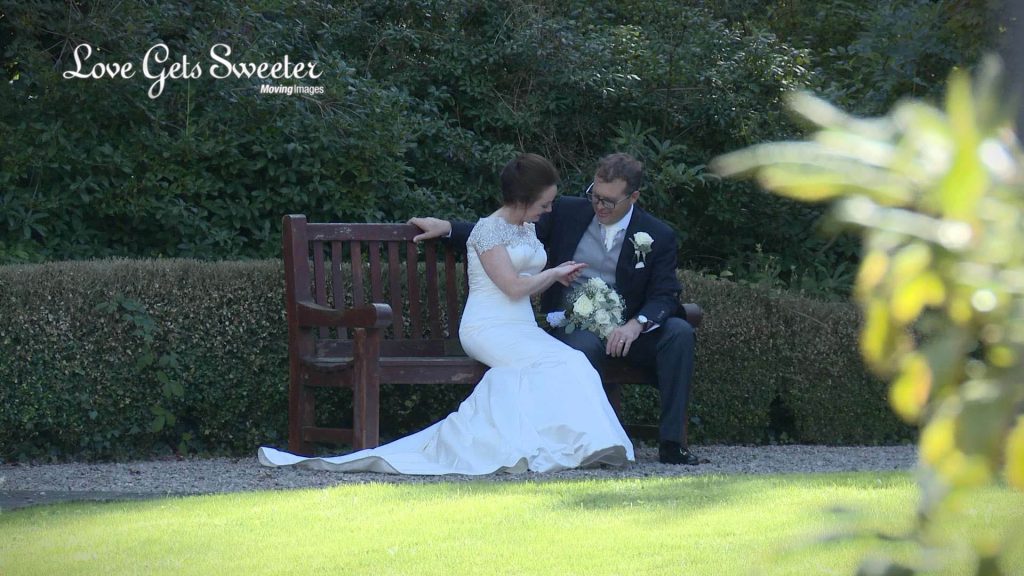 bride looking at her new wedding ring at Eaves Hall