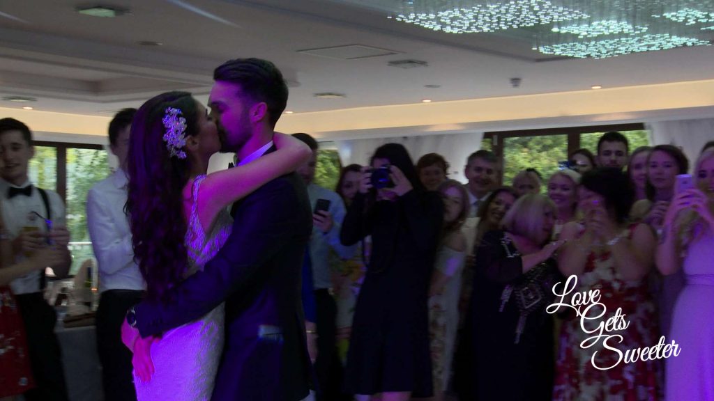 first dance on the sparkly dancefloor with pink lighting at armathwaite hall