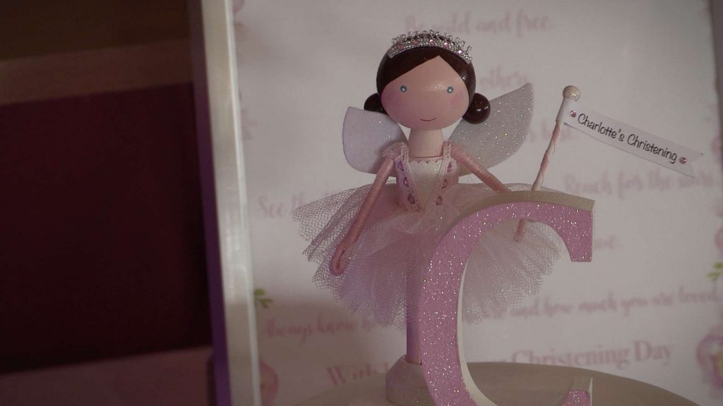 cute fairy topper on a christening cake at Rhyl Golf course