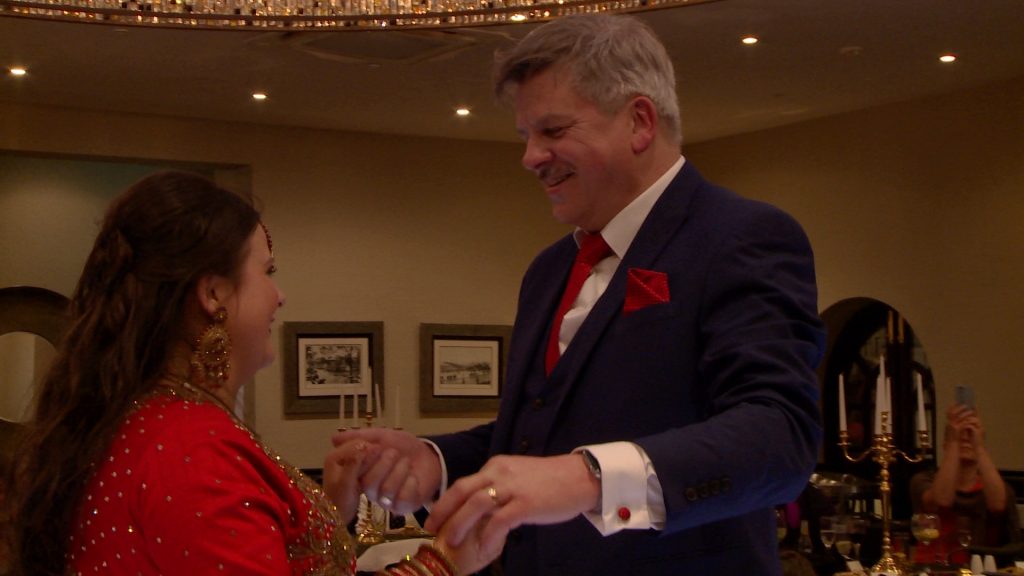 a brides dad smiles as the begin their father daughter dance at the bold hotel