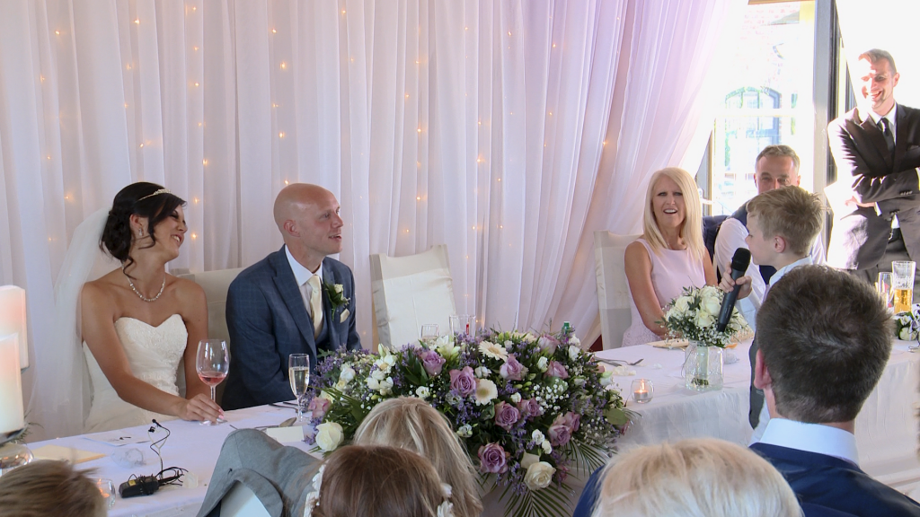 the page boy makes his own impromptu speech during the wedding breakfast at the blue mallard in Burscough