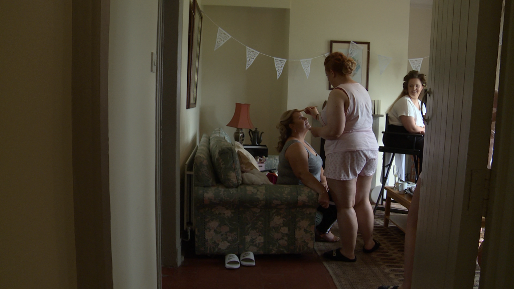 The bride and her Mum get their make up done in a cottage on thornton manor estate