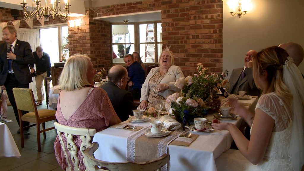 a magician has all the guests laughing out loud during his magic show at abels harp