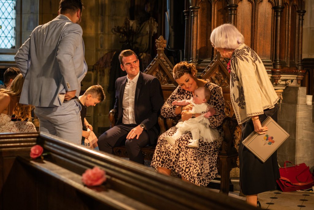 a natural moment after their baby girl has been christening at the Unitarian church in Todmorden with a humanist celebrant instead of a priest