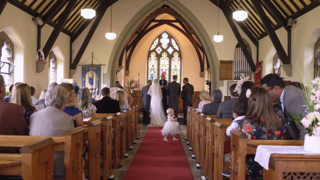 a wide shot of a wedding at St Marks Church in Dunham Massey