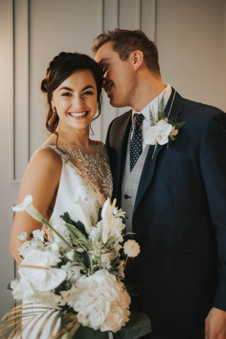 a bride smiles at the camera at a wedding at Albert's Standish by Bobtale photography