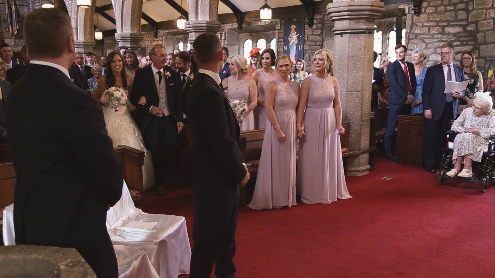 a wide video shot of a wedding at St Bartholomews and St John’s Church