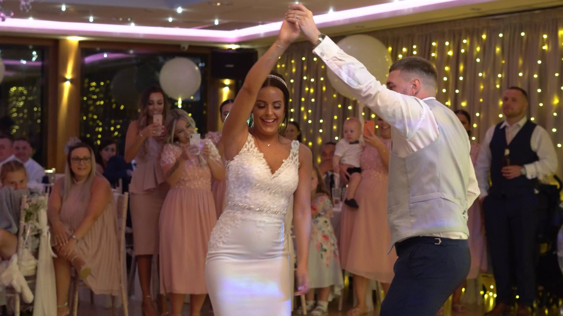 bride and groom enjoy their first dance at Modderhall Oaks