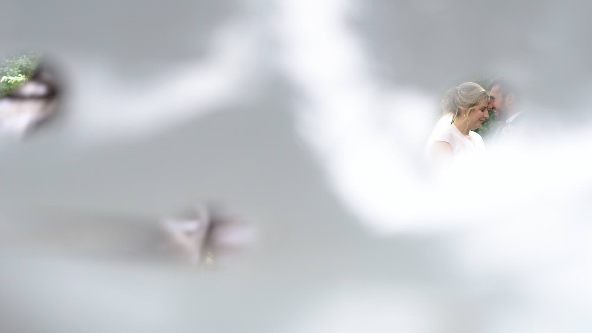 bride and groom through a tractor seat at Wyresdale Park