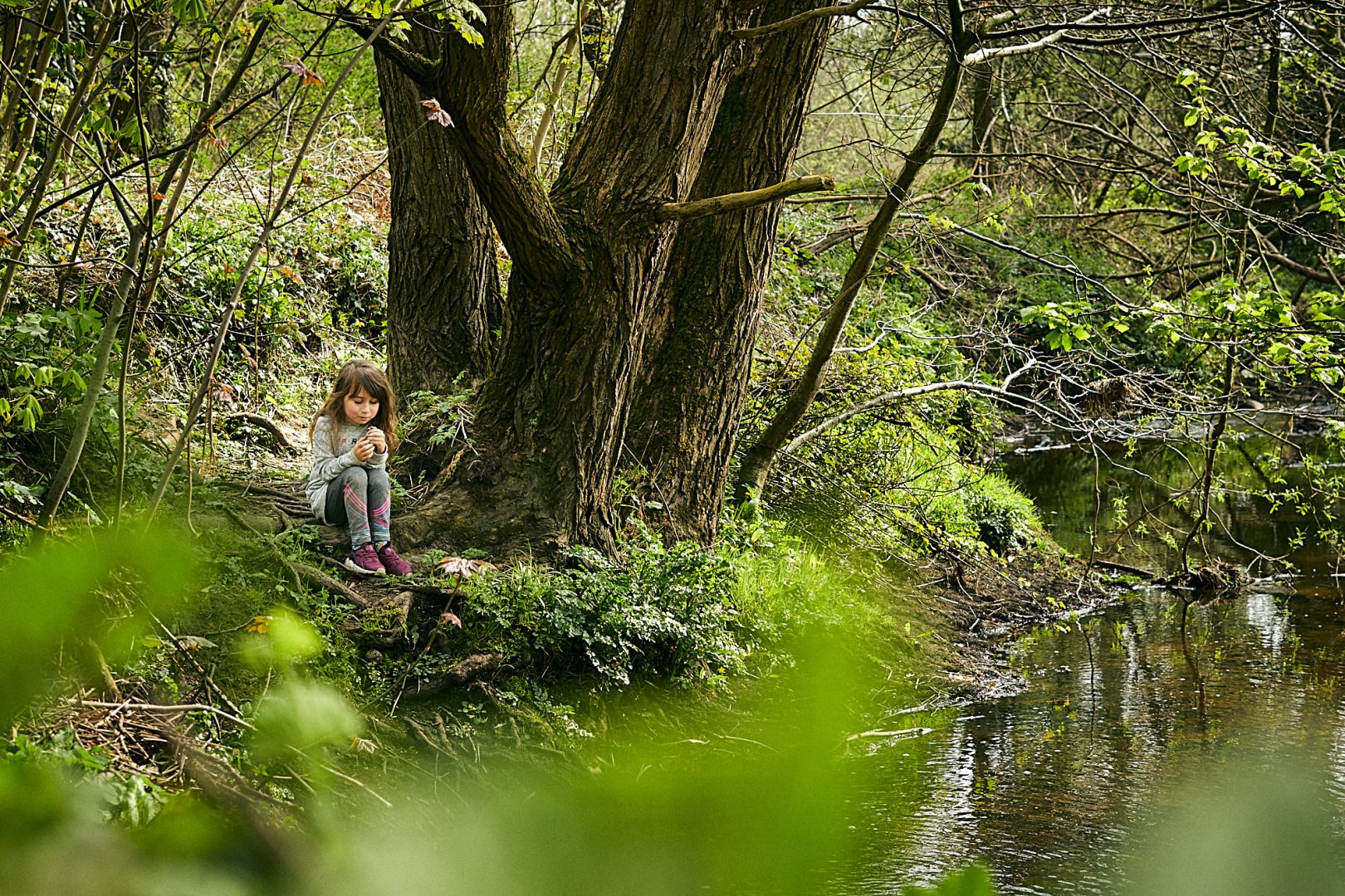 girl sits to rest during lockdown walk in Burscough