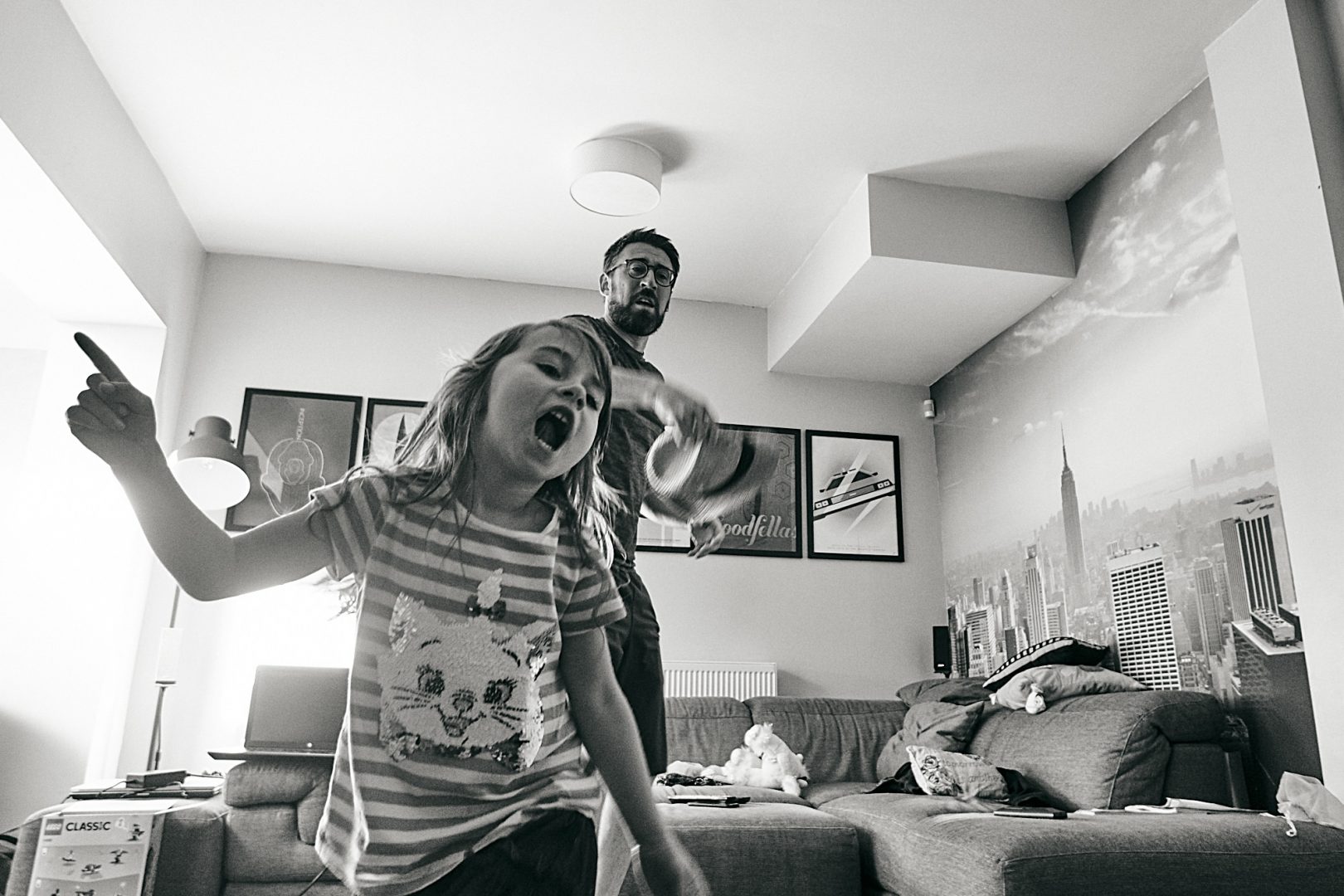 documentary family photo of girl and dance in living room