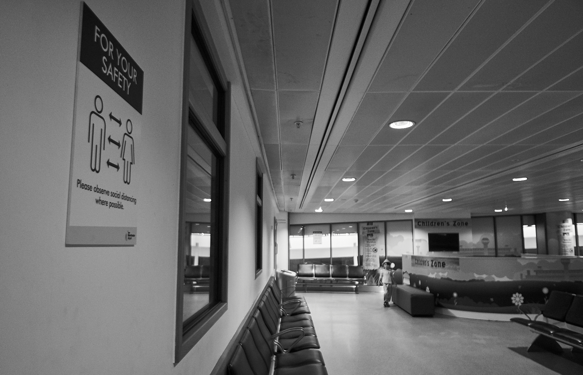 empty terminal at manchester airport during coronavirus