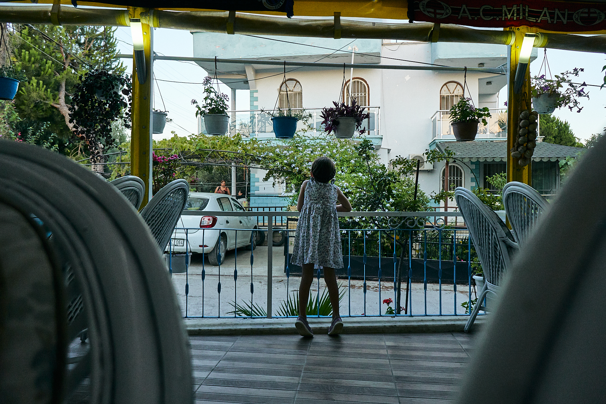 child looks lonely on family holiday during covid