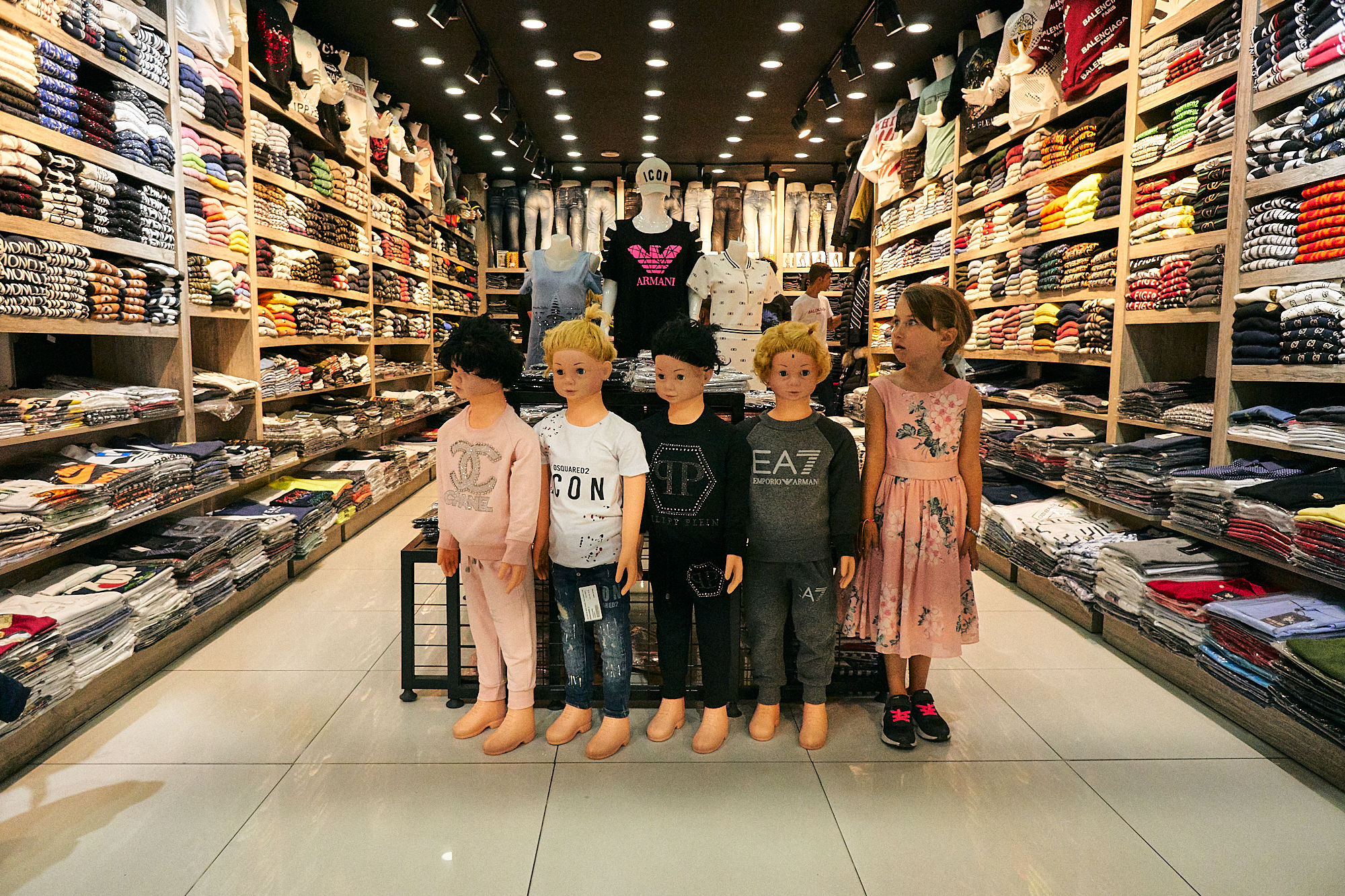 fun photo of girl pretending to be a shop plastic model