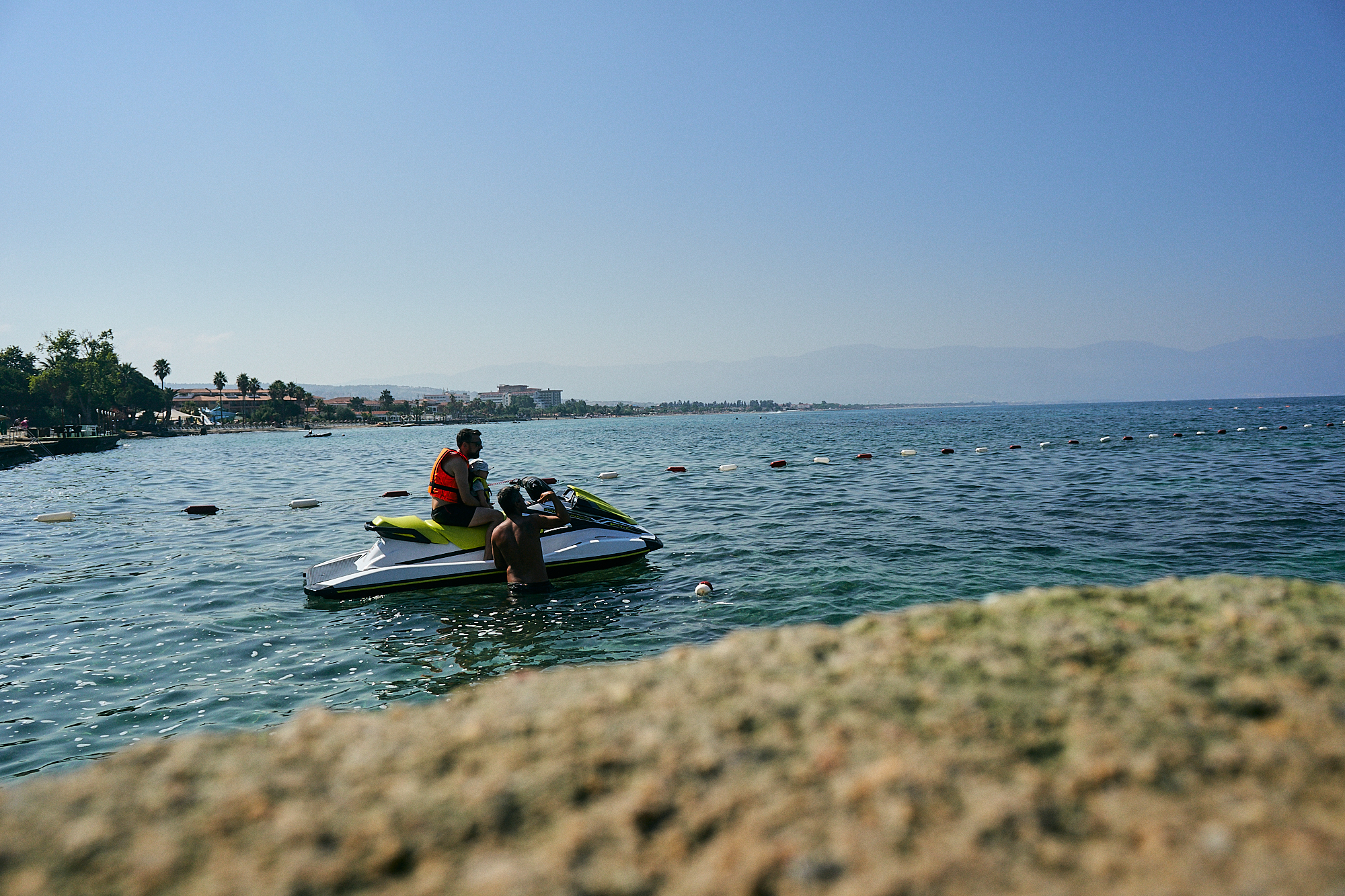 dad and daughter on jet ski