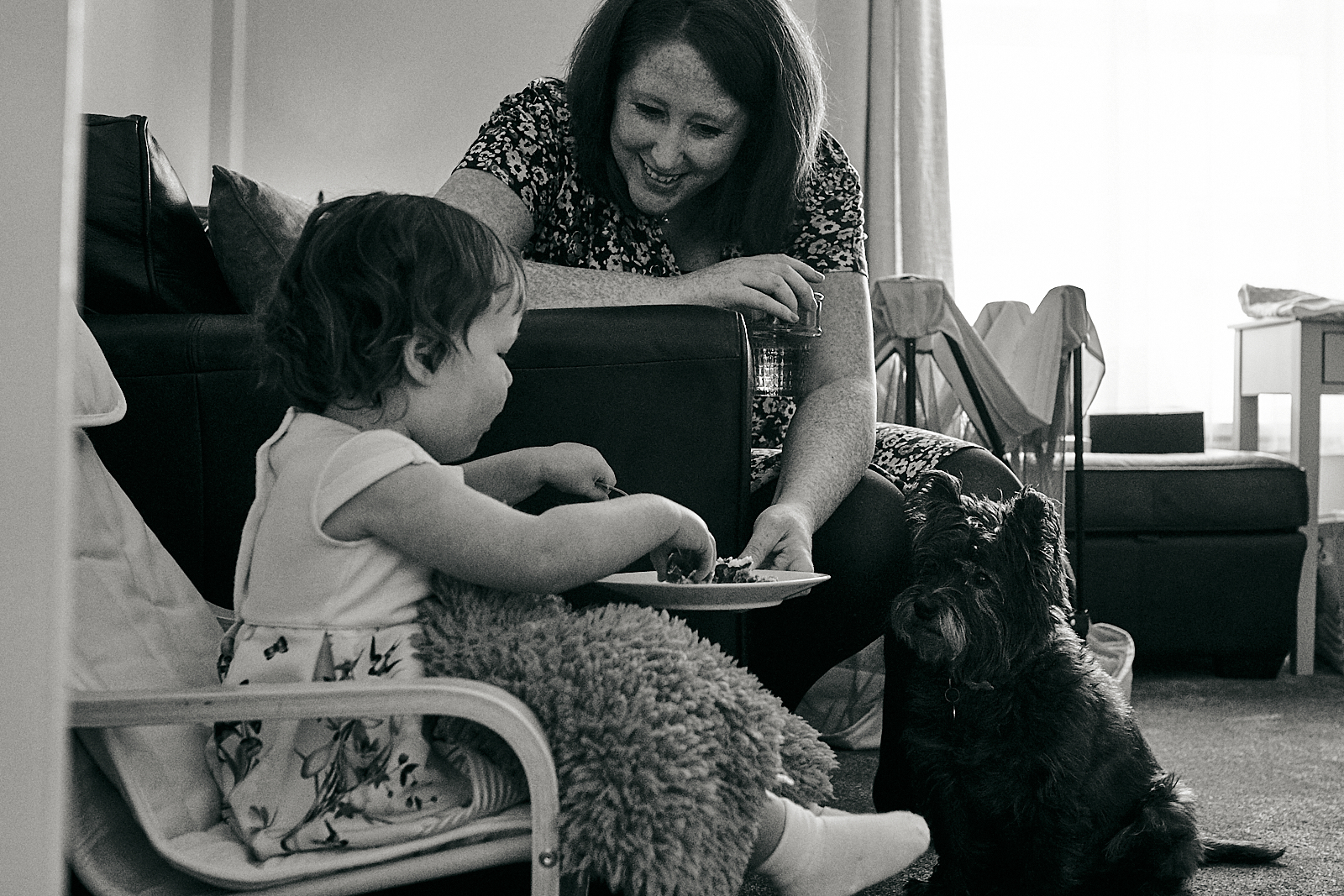 candid photo of family eating at home