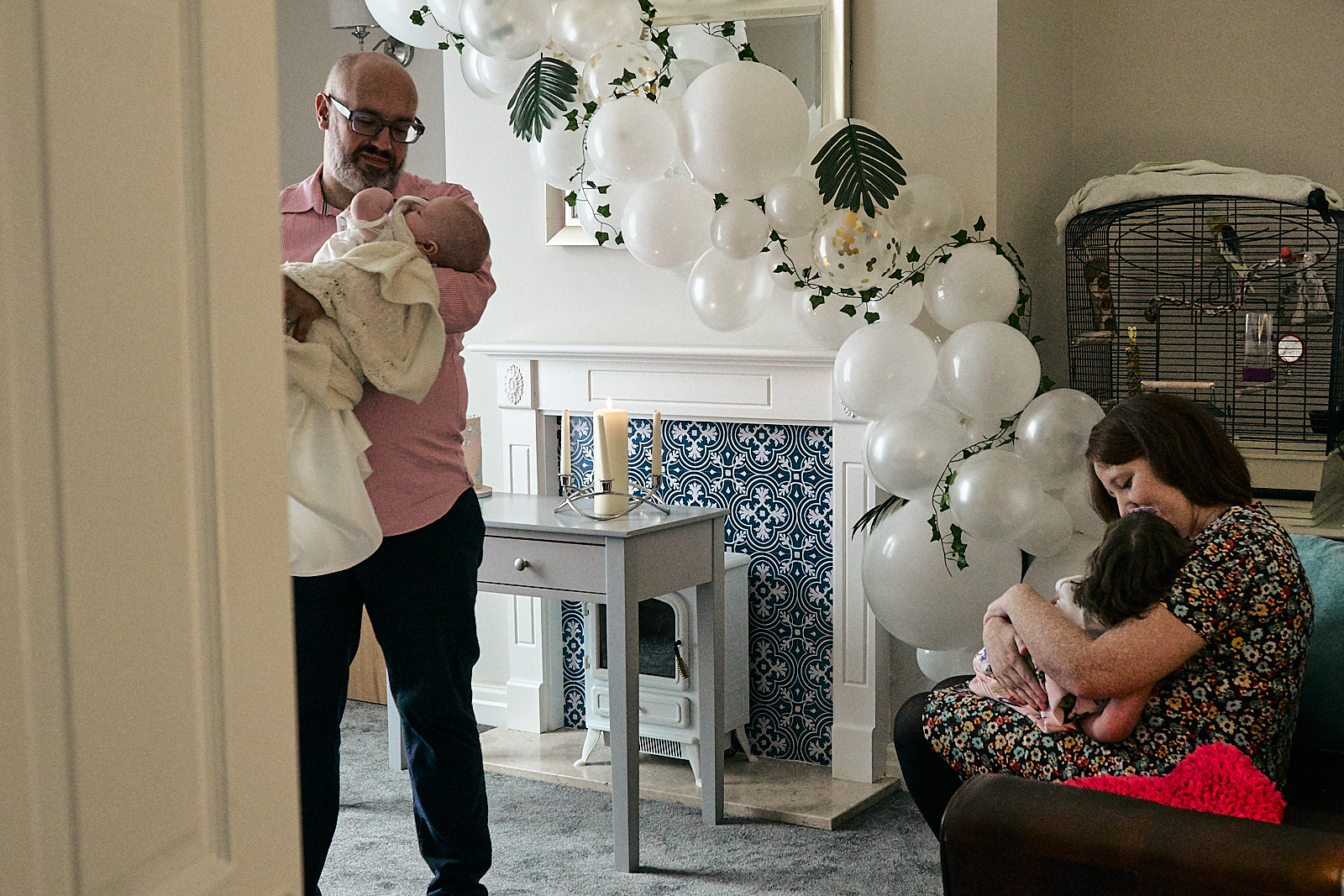 parents in living room during virtual lockdown naming day