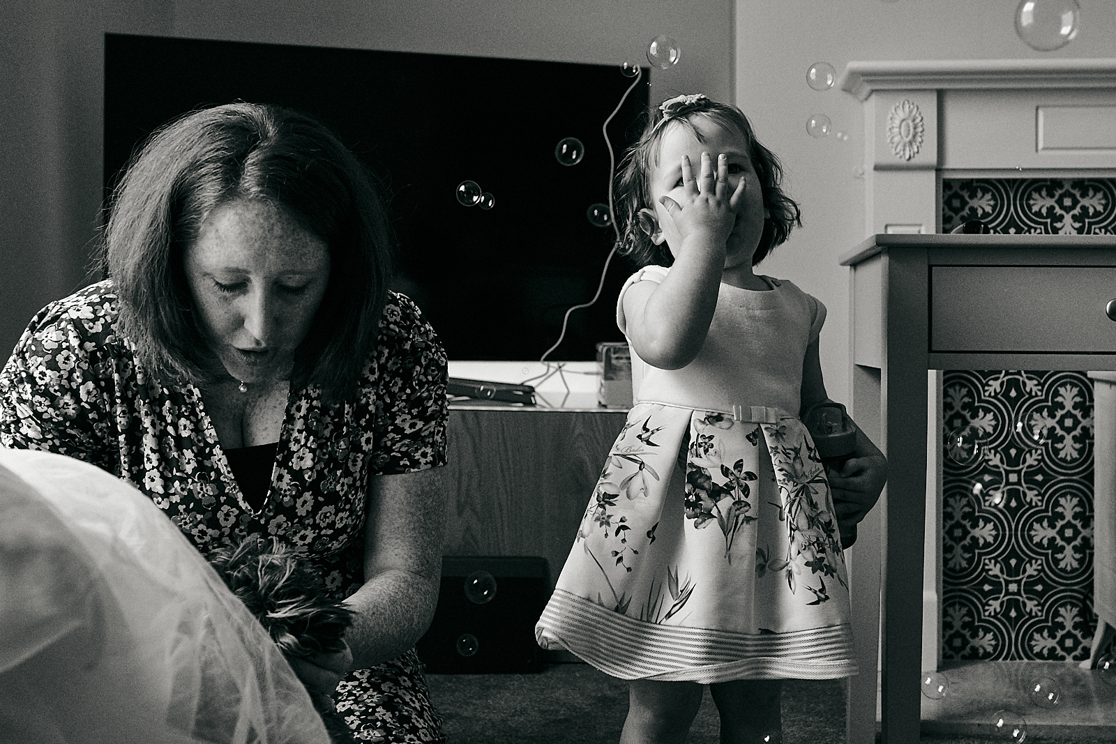 child eats bubbles during naming ceremony in lancashire