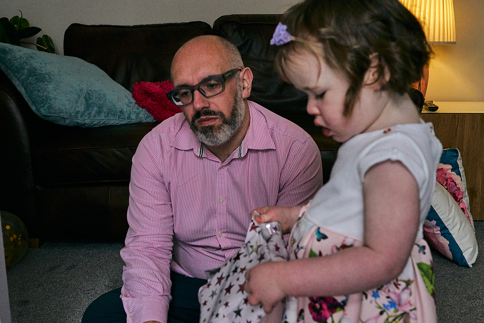 documentary photo of dad looks tired and fed up after naming day