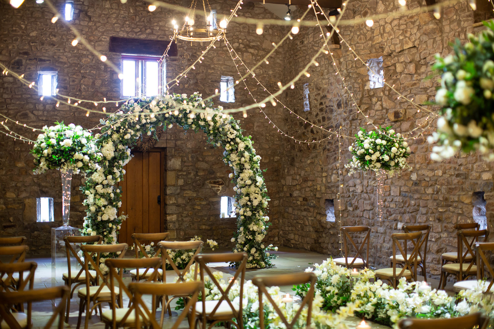 moongate white roses inside tithe barn lancashire