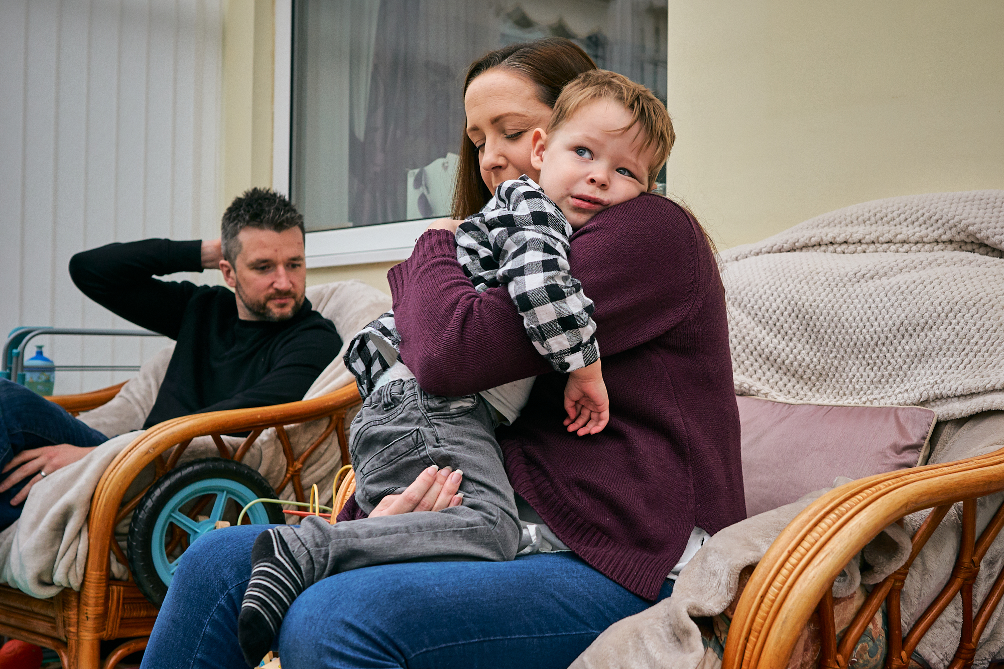 candid photo mum enjoys a rare hug from young son
