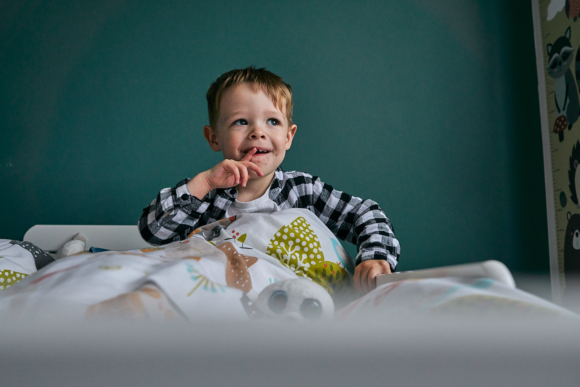cute photo of little boy on bed
