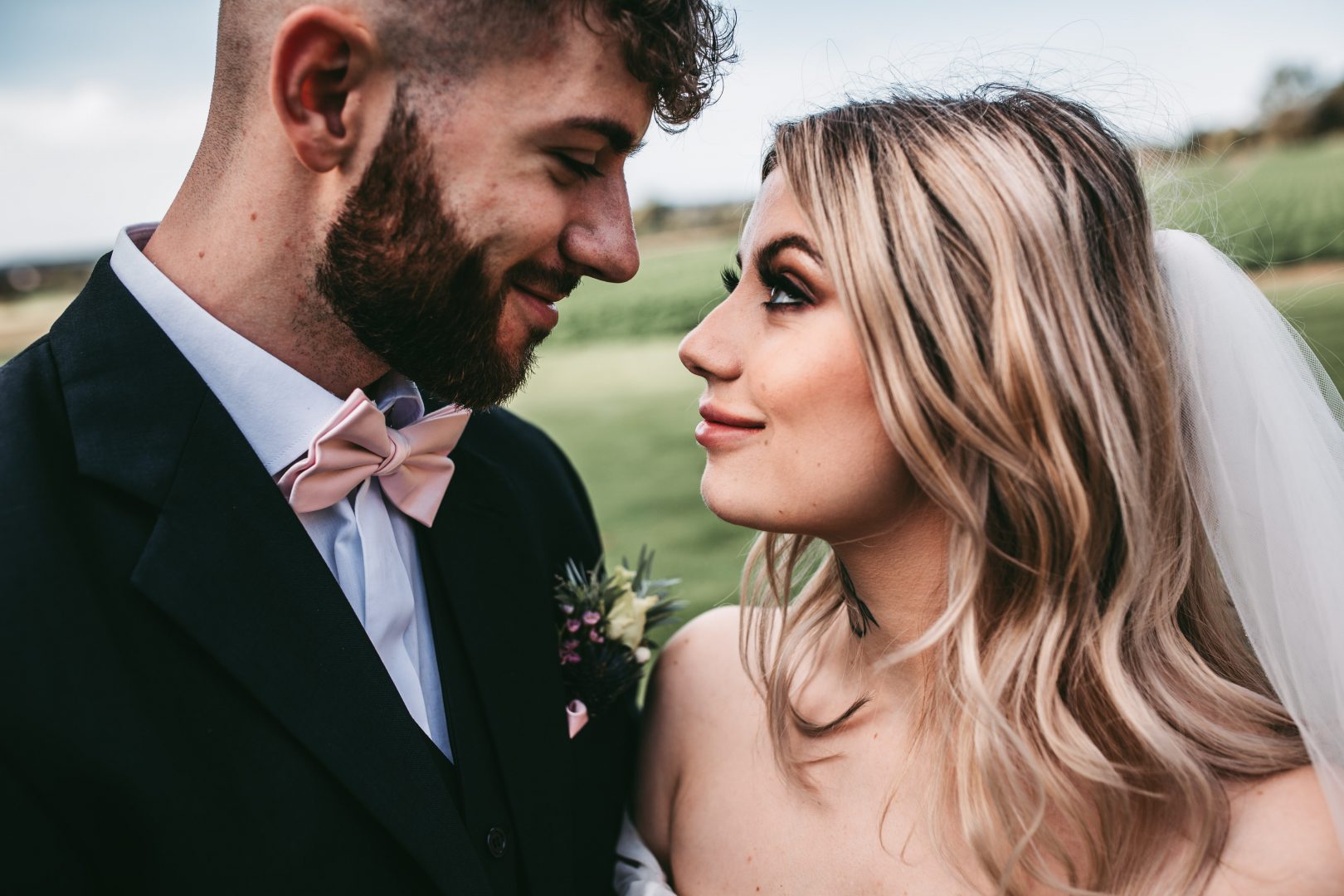 close up photo of bride and groom