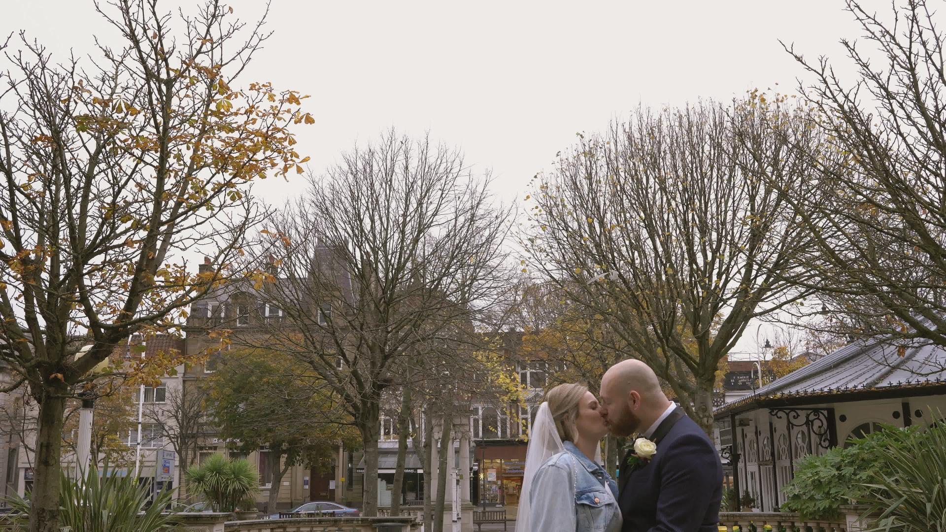 newlywed couple kiss after southport wedding