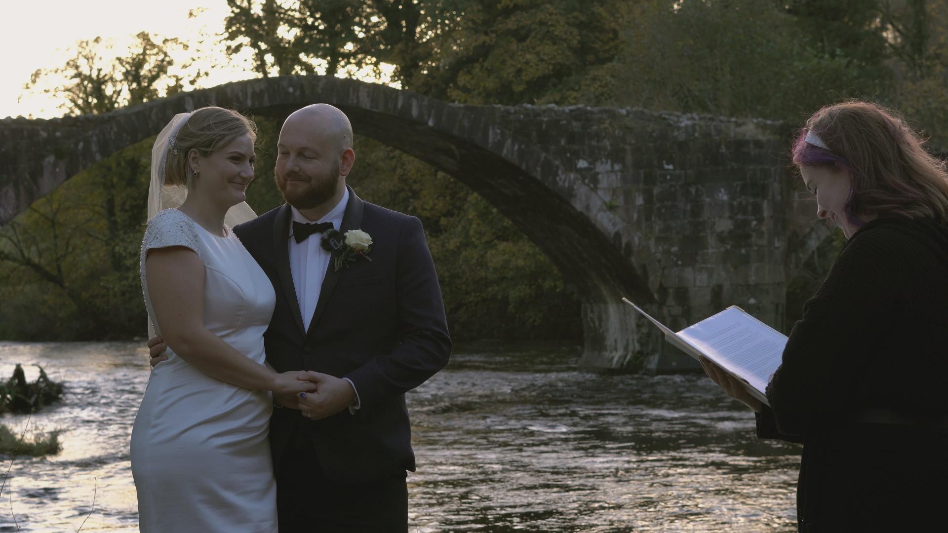 couple laugh during outdoor elopement ceremony