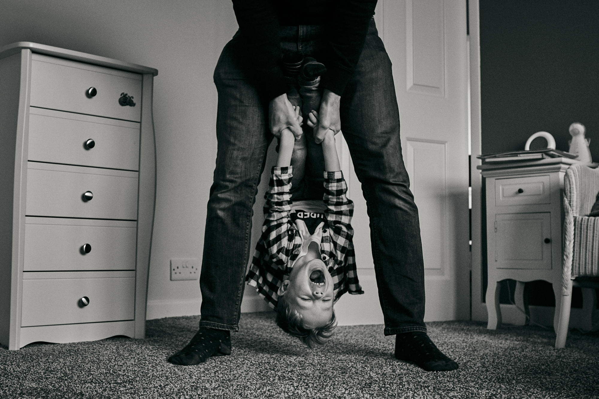 natural family photography cheshire dad swinging child