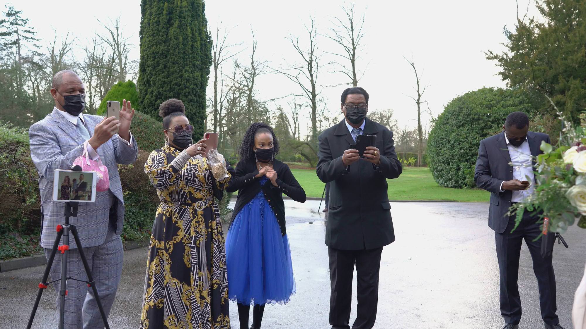 wedding guests in masks after micro wedding in Preston
