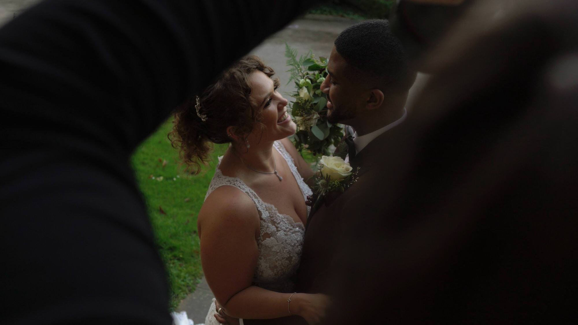 natural photo of couple being photographed on wedding day