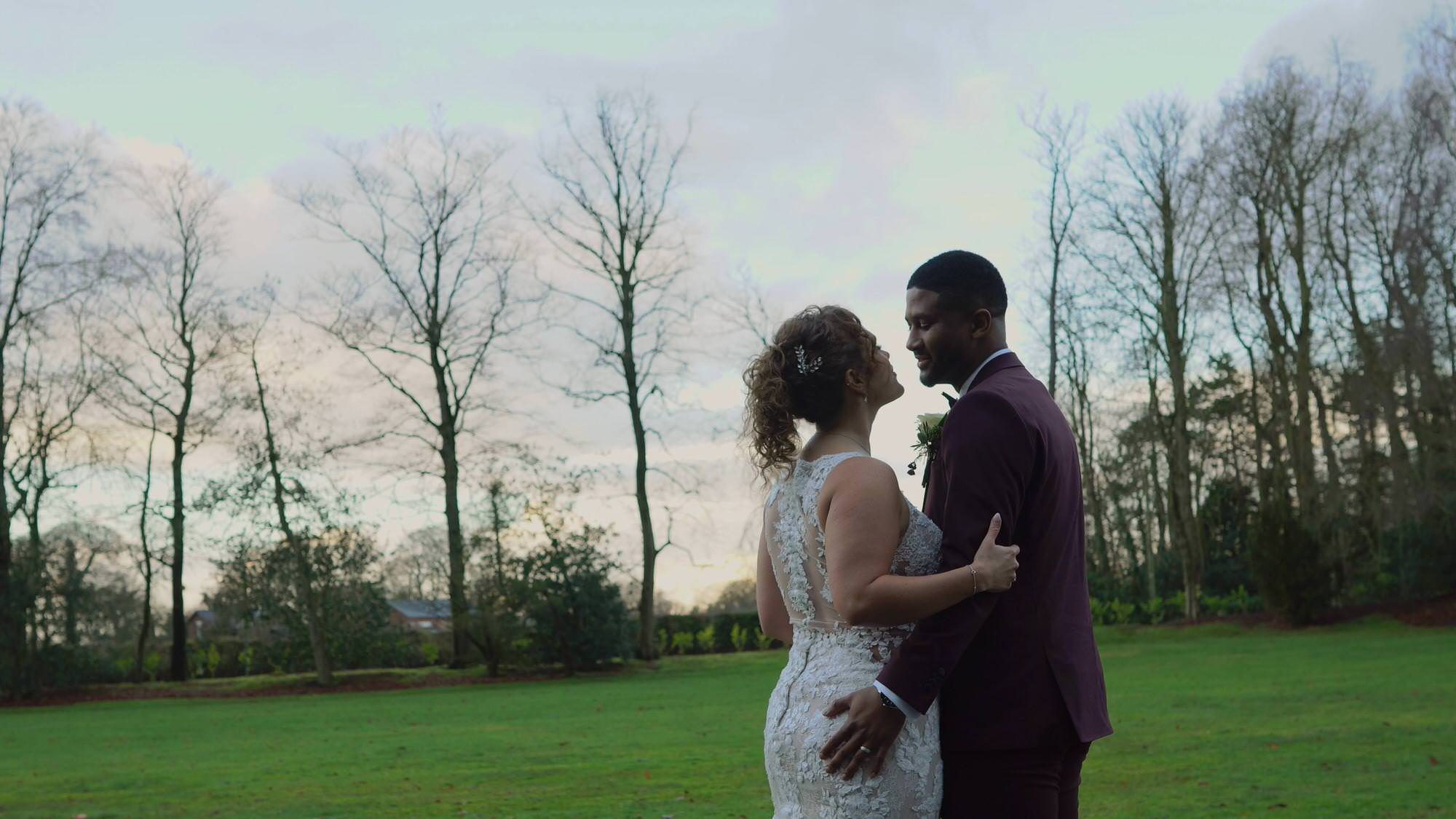 couple relax for wedding videographer in Preston