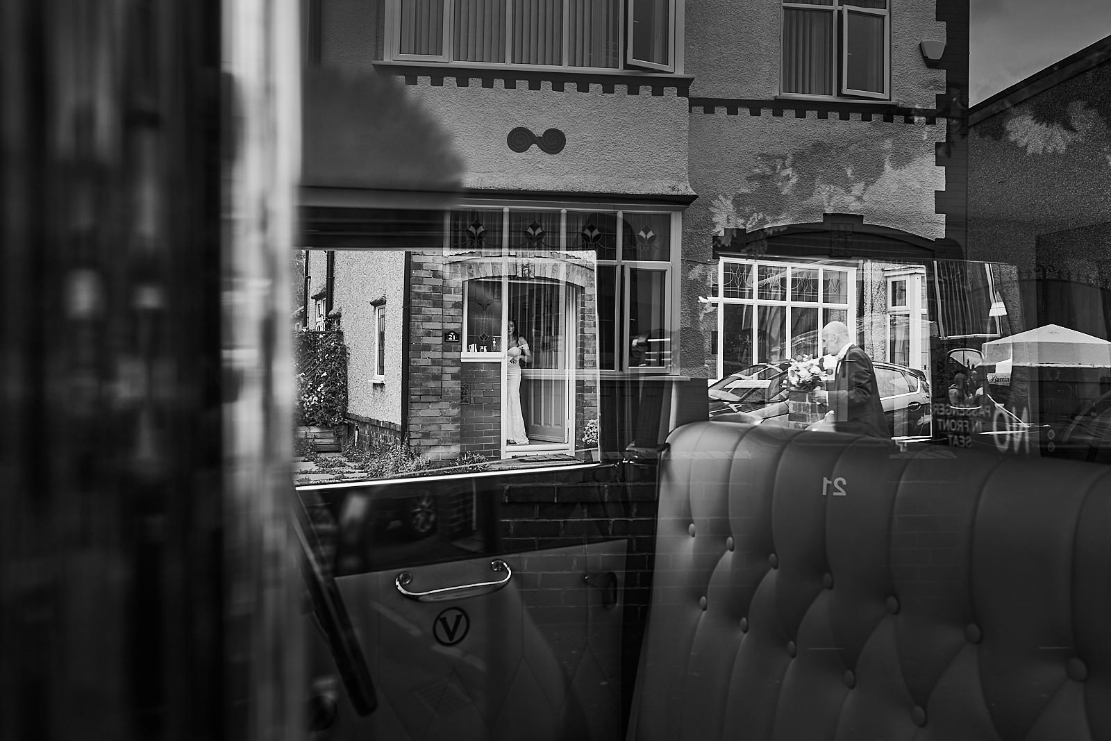 candid creative photo of bride leaving home to get married