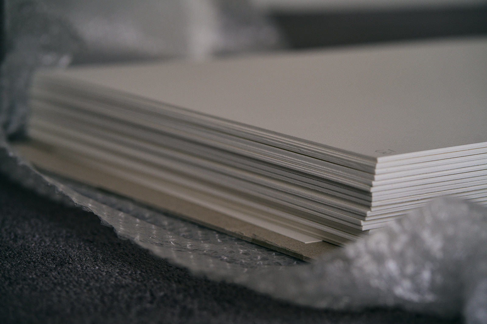 Folio fine art prints stacked ready for judging