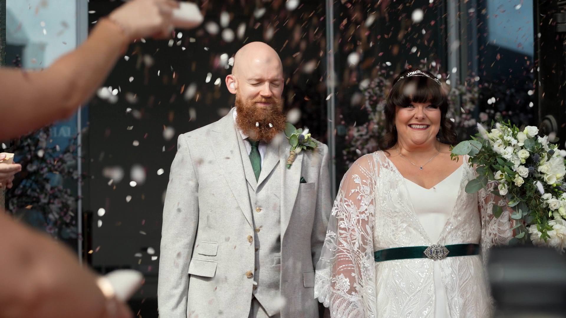fun confetti on video outside St Georges Hall