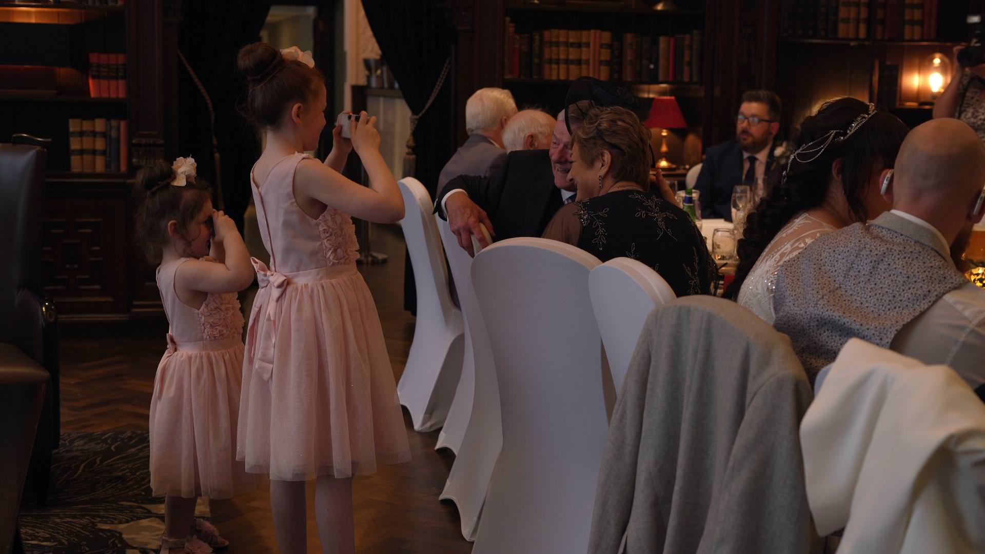 wedding guests in library lounge Doubletree Hilton