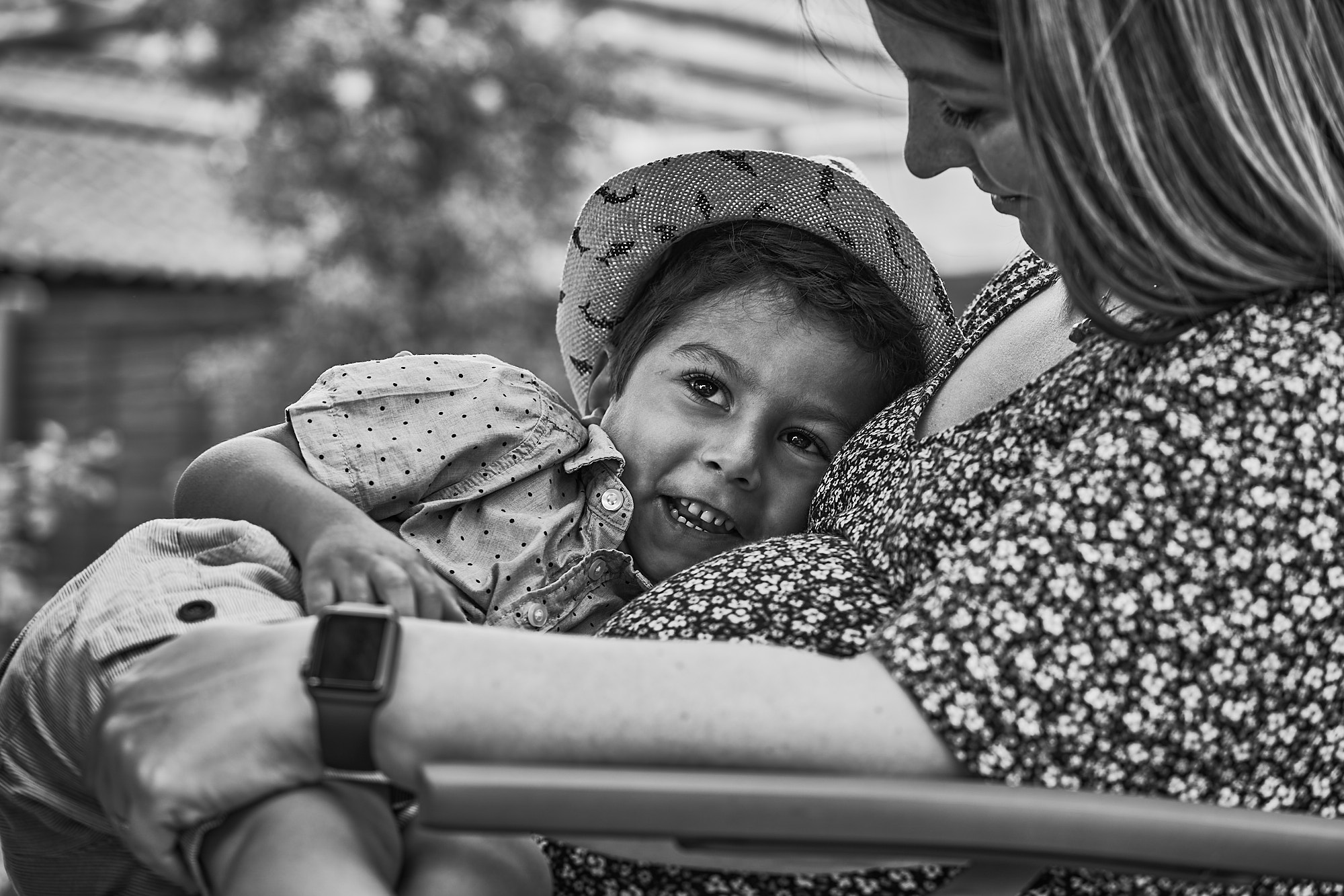 son cuddles mum and bump during natural maternity photoshoot in cheshire