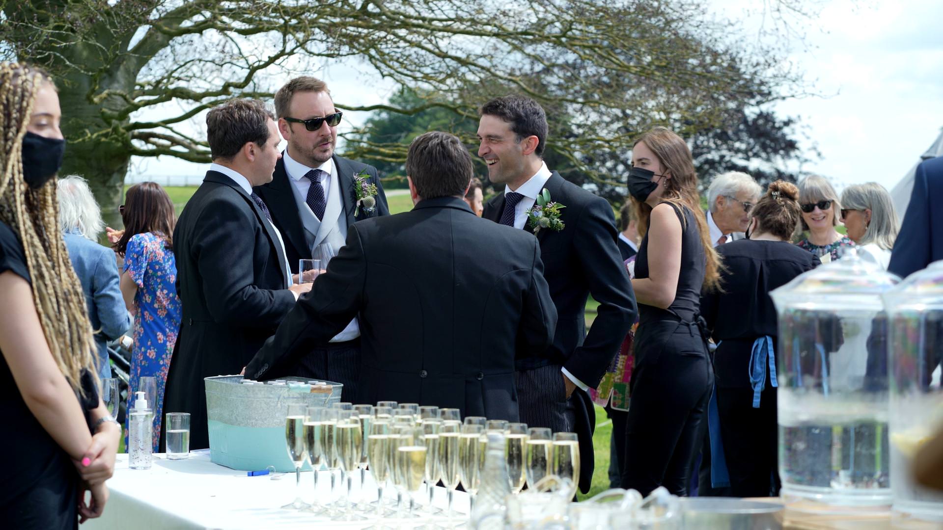 guests mingle during wedding reception