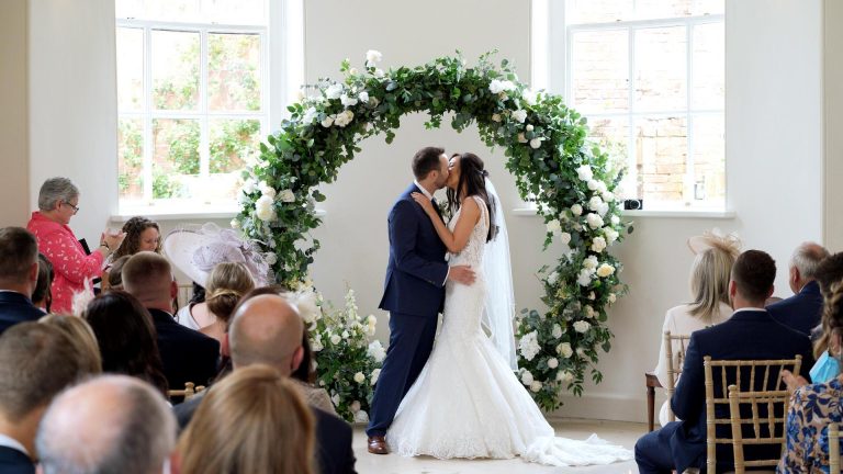 videographer films couple kiss at Iscoyd Park Ceremony