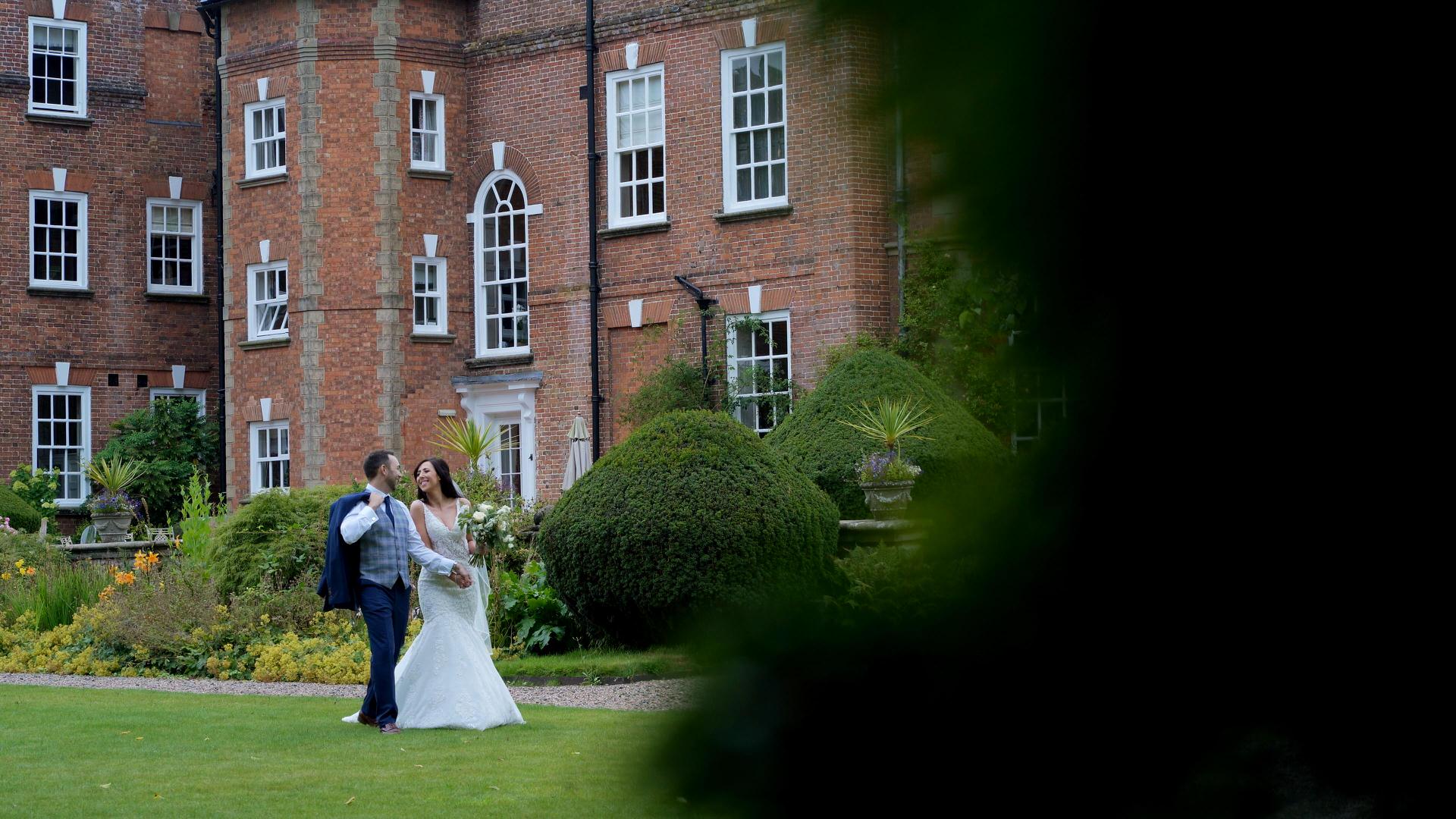 natural shot of couple in Iscoyd park gardens