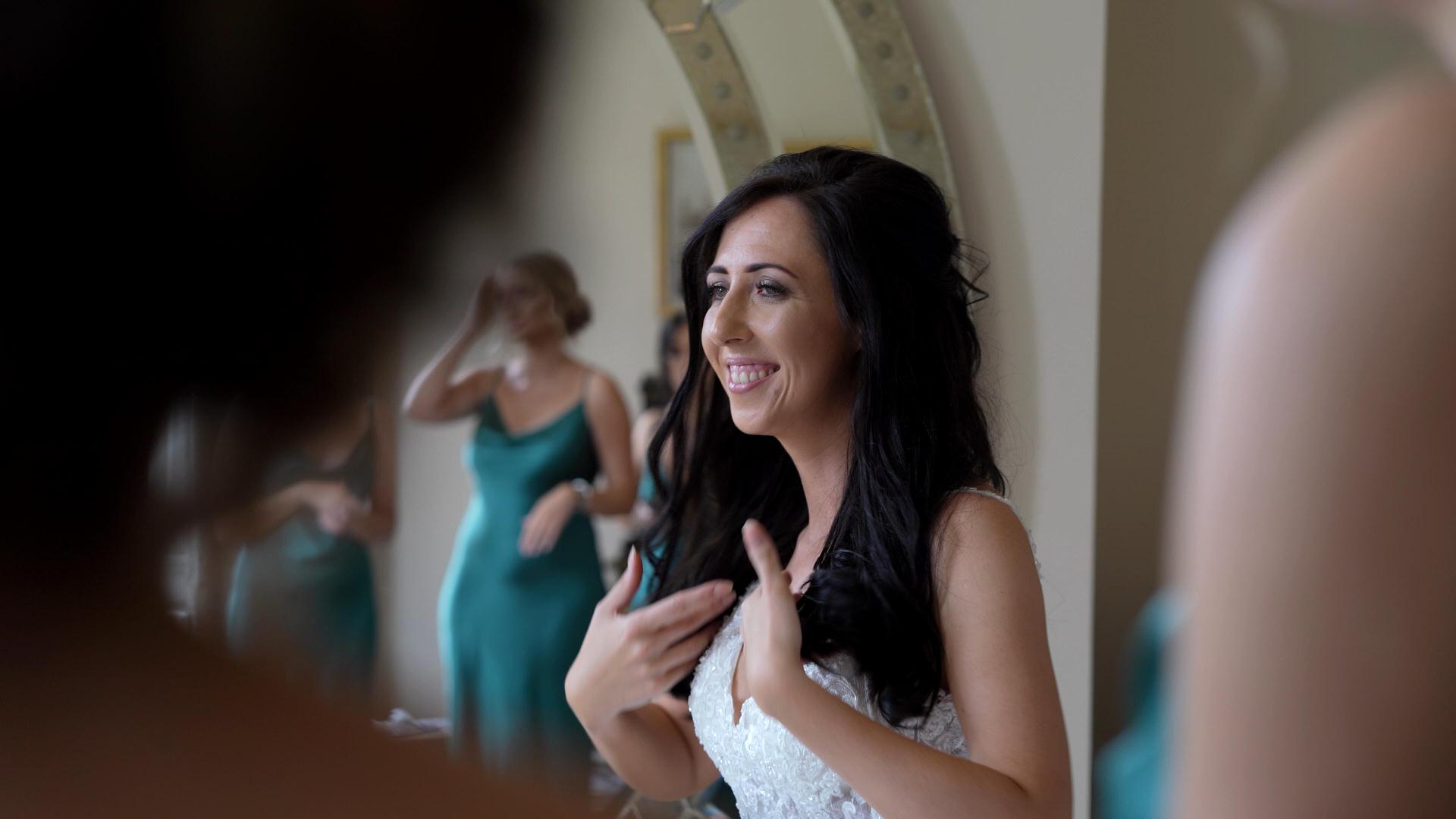 bride looks excited getting ready at Iscoyd Park