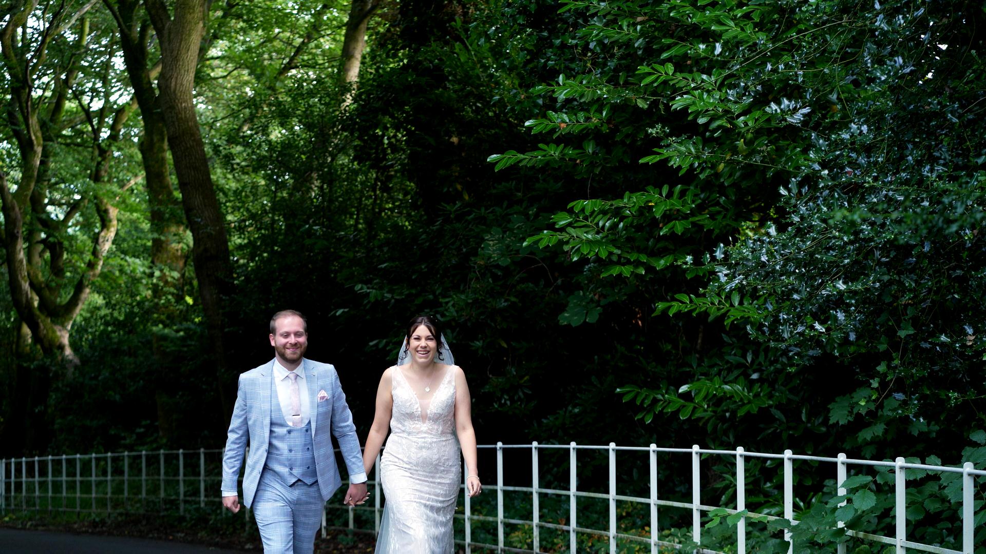 couple walk down drive at Ashfield House